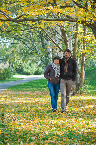 Romantic young beautiful couple on autumn walk © Max Topchii