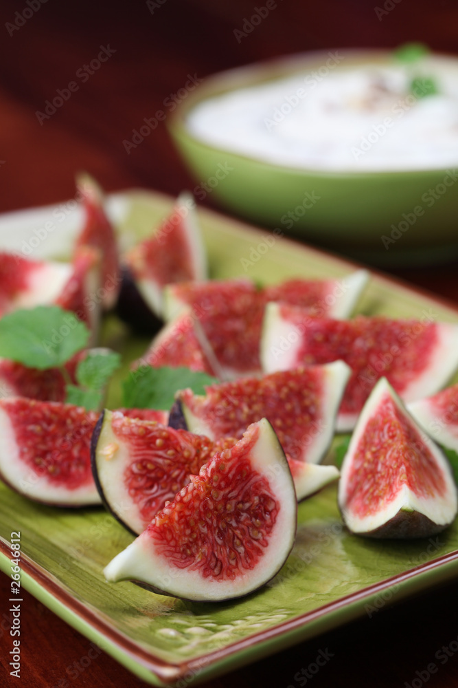 Black mission fig appetizer with nut and honey cheese dip Black mission fig appetizer with nut and honey cheese dip