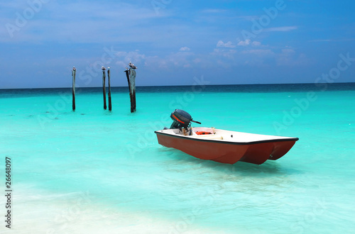 Safety boat on the paradise water. © maxkateUSA