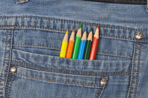 Colored pencils in jeans pocket