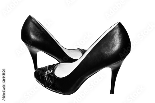black female shoes on a white background