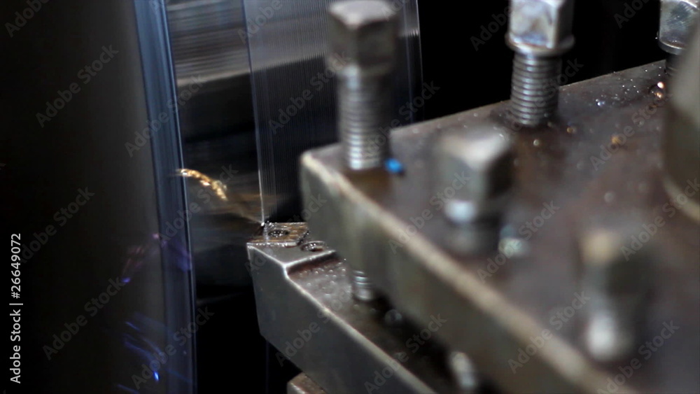 Metalworking lathe, metal shavings in factory Metalworking lathe, metal shavings in factory