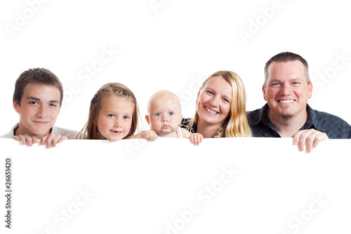 happy family behind white board