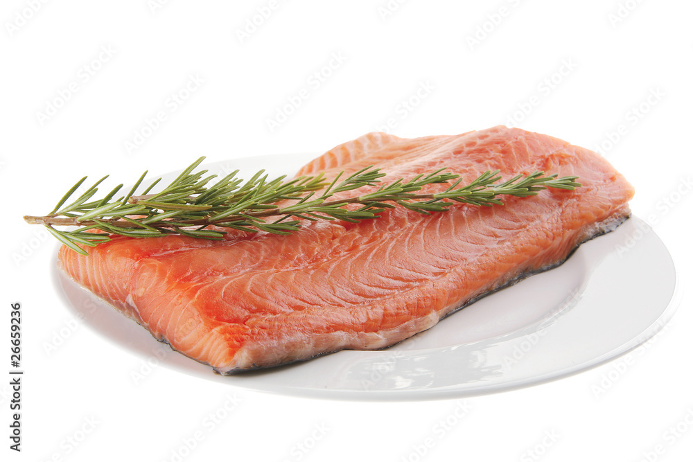 fresh uncooked salmon fillet on plate with rosemary fresh uncooked salmon fillet on plate with rosemary