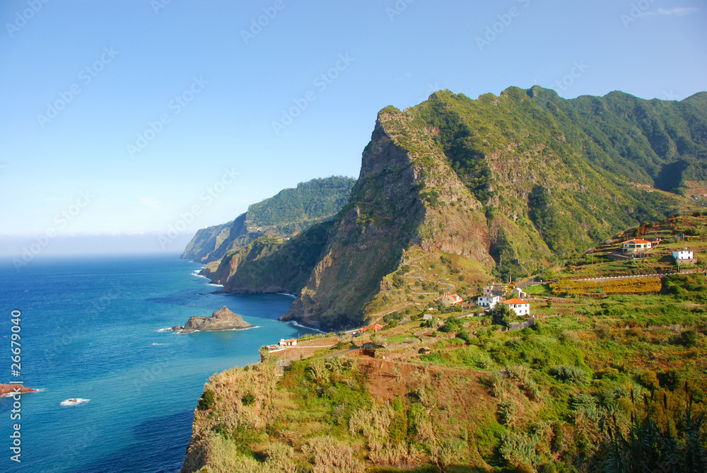 Madeira Island - rocks, blue sky and atlantic ocean Madeira Island - rocks, blue sky and atlantic ocean