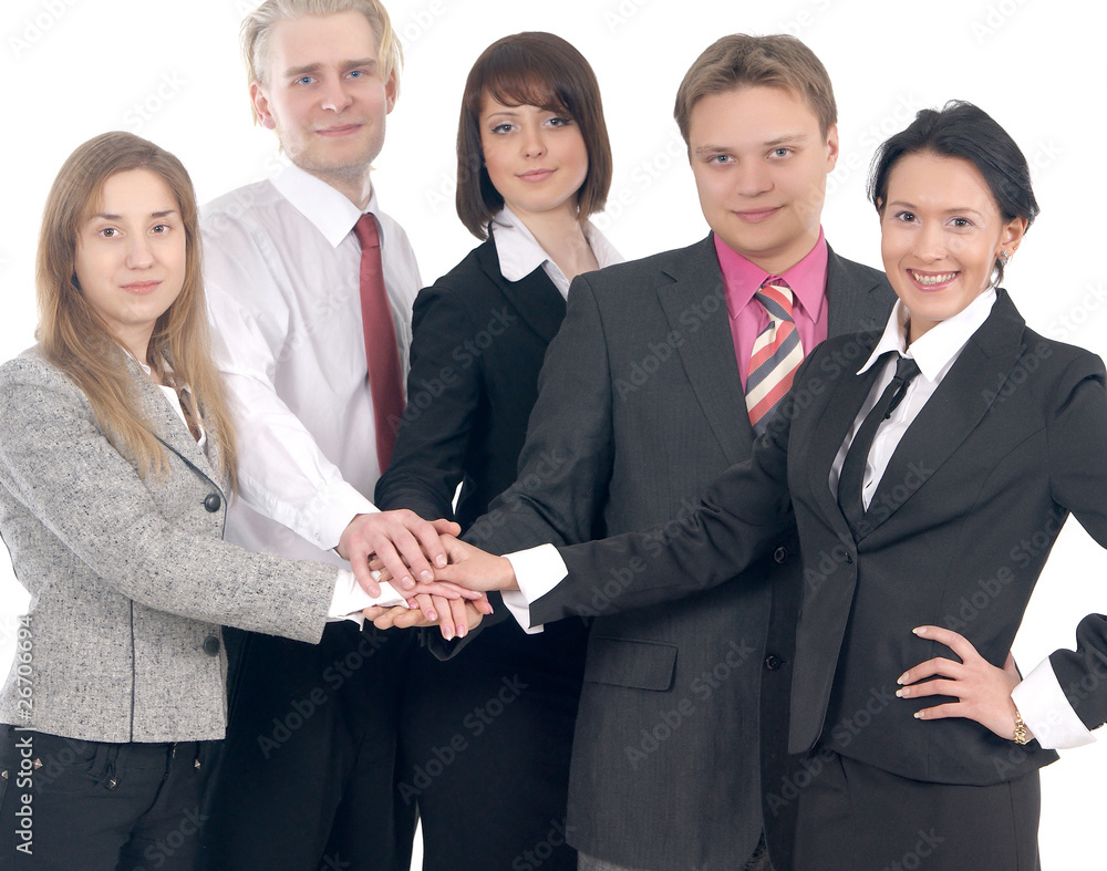 A group of five young businesspeople in formal clothes A group of five young businesspeople in formal clothes