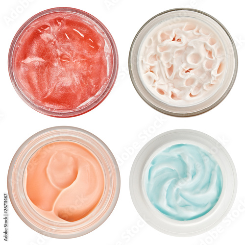 Set of 4 different dermal creams and gels isolated on white