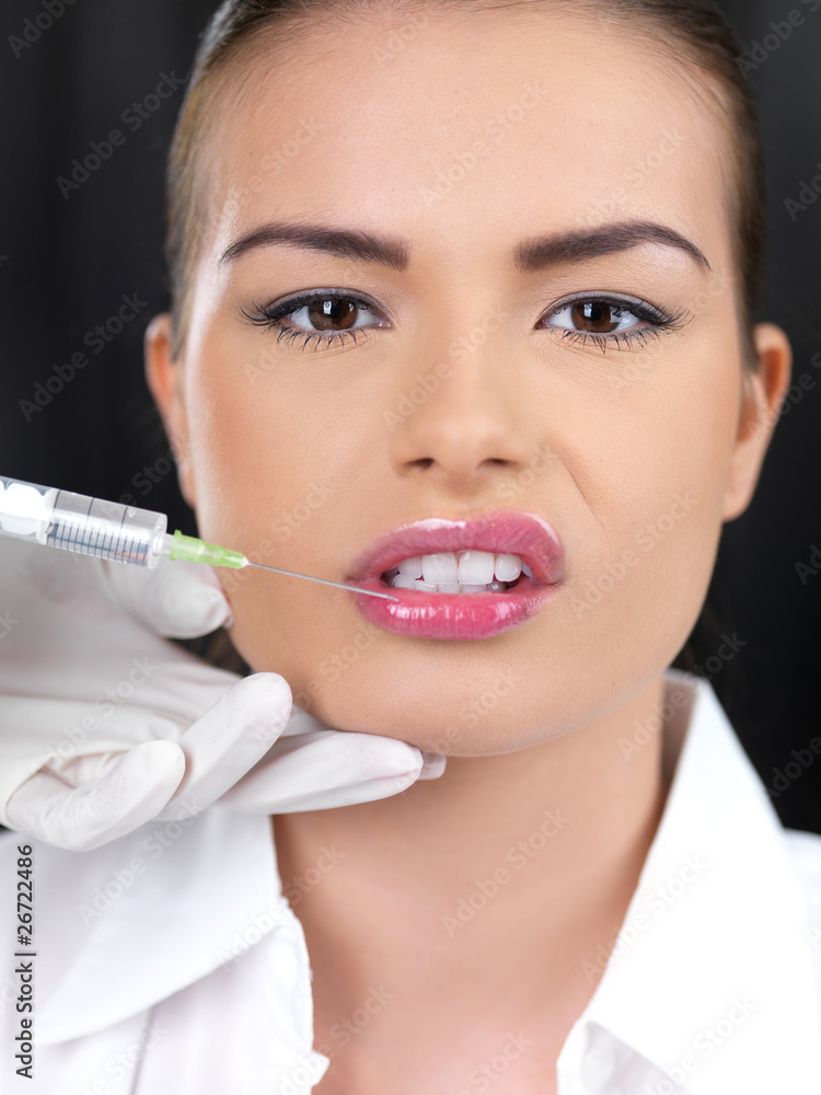 Portrait of beautiful woman, she gets botox injection Portrait of beautiful woman, she gets botox injection