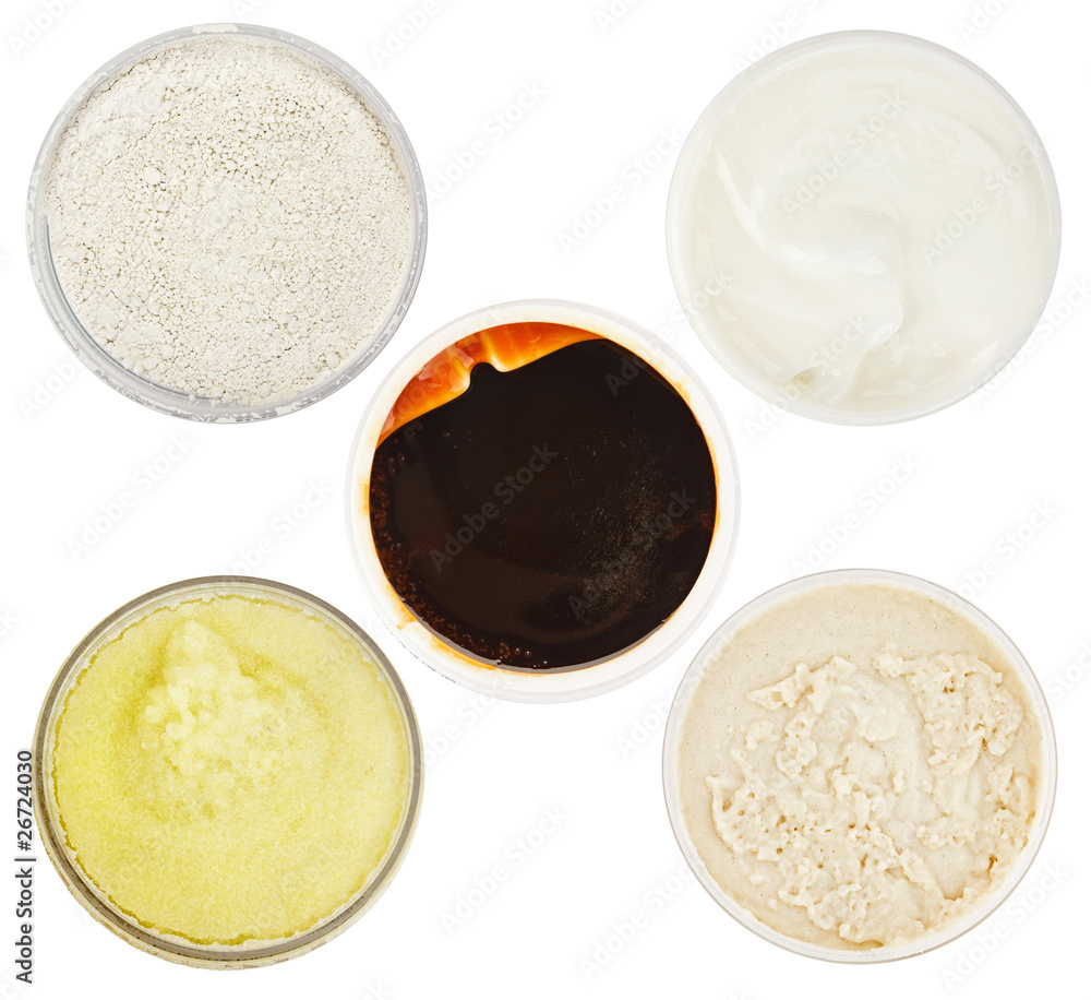 Set of 5 different dermal masks and scrubs isolated on white Set of 5 different dermal masks and scrubs isolated on white