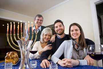 Jewish family celebrating Chanukah