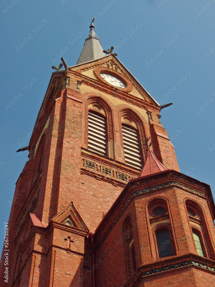 Church tower from red bricks