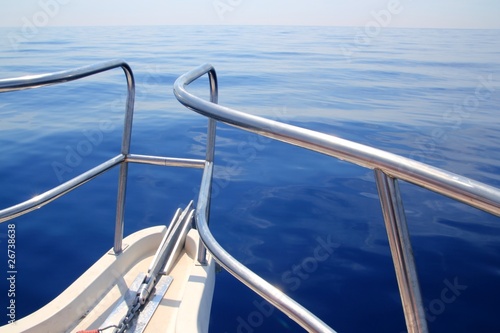 boat sailing blue calm ocean sea bow railing © lunamarina