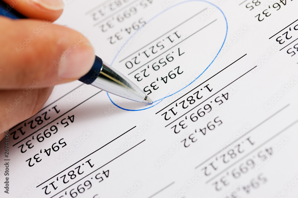 Accountant working on numbers Accountant working on numbers