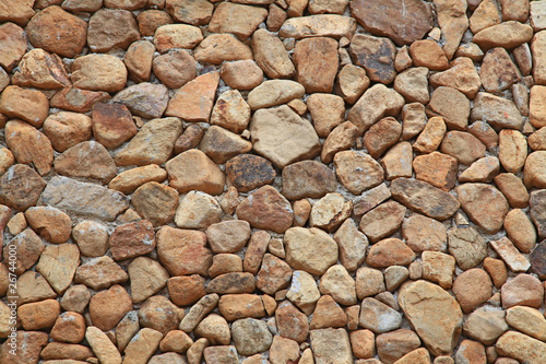 Stone Brick Wall made of fragment stones in irregular shapes