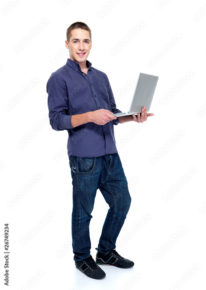 Full-length portrait of man with laptop