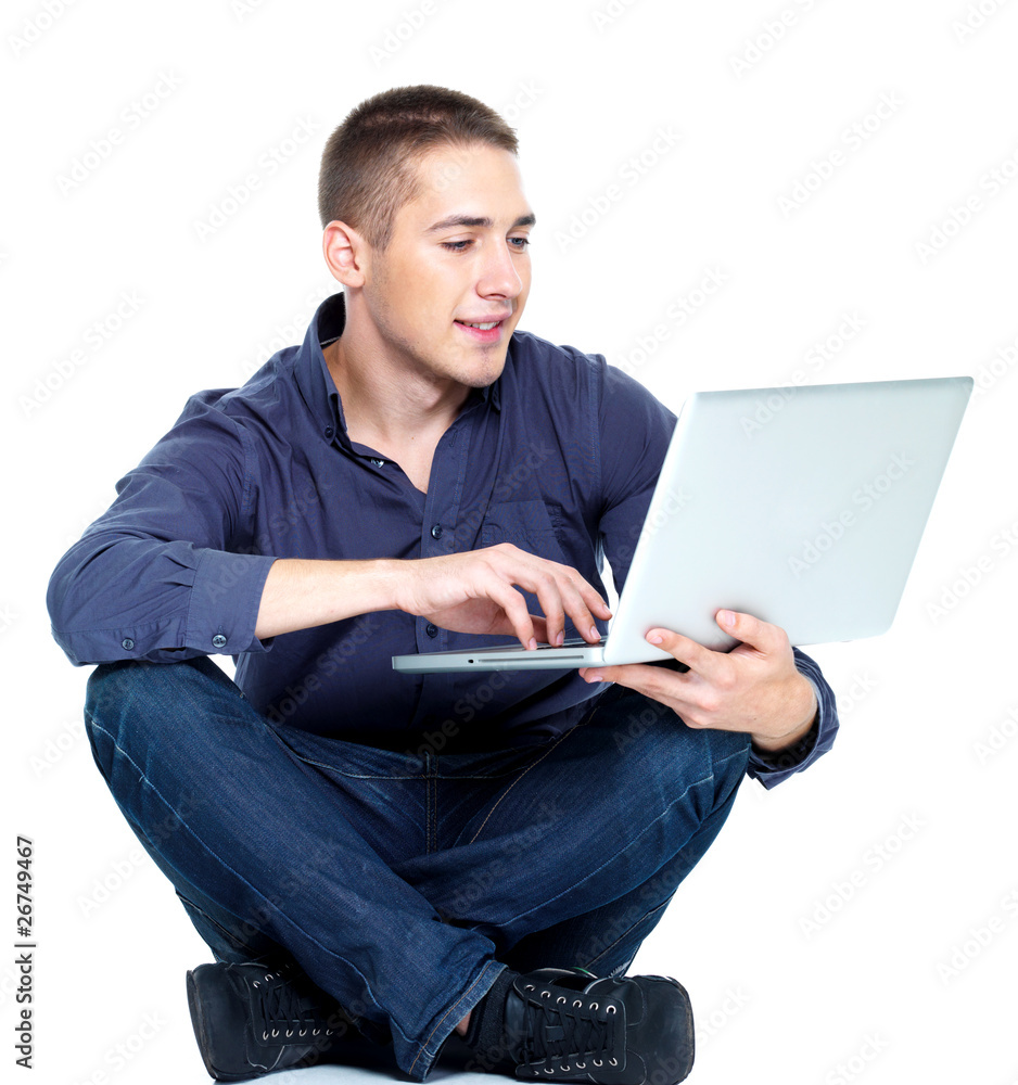 man with laptop sitting on white background man with laptop sitting on white background