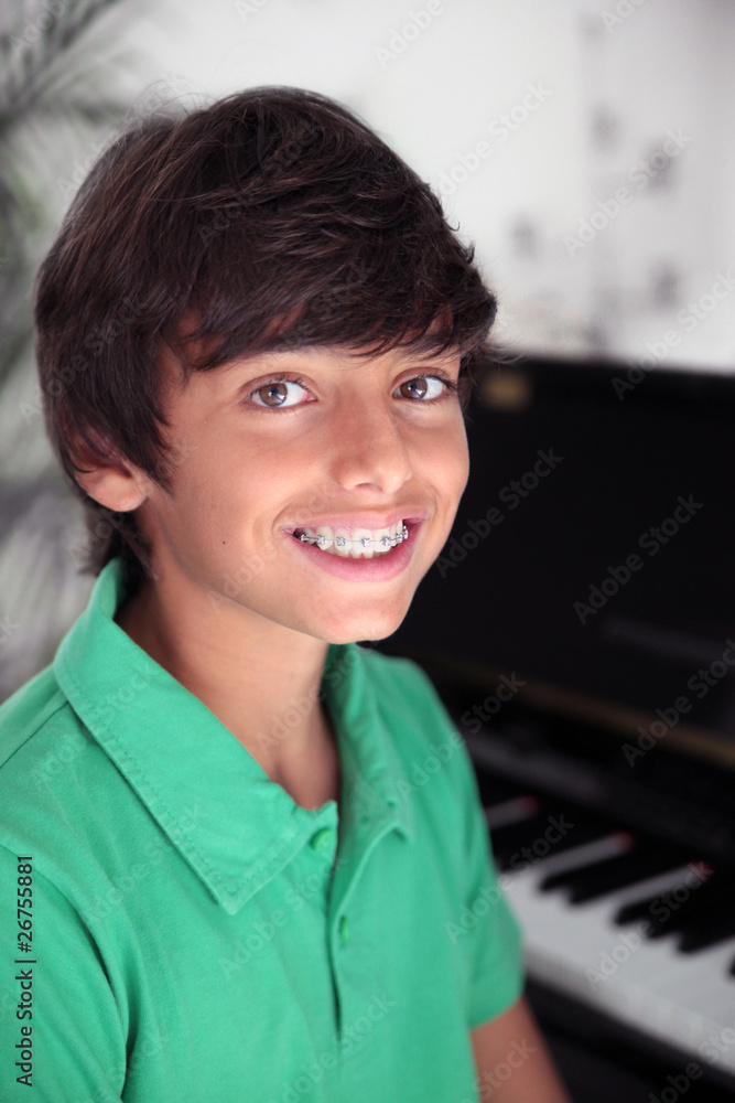 Fototapeta premium Portrait of boy with braces
