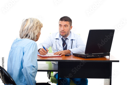 Physician man explaining to senior woman