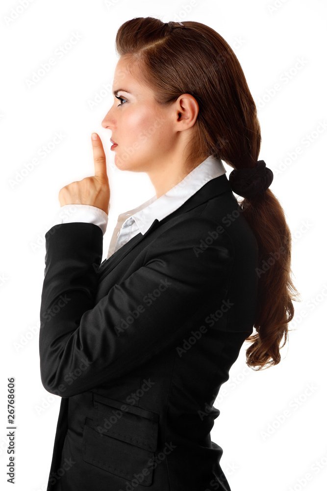 modern business woman with finger at mouth isolated on white. modern business woman with finger at mouth isolated on white.