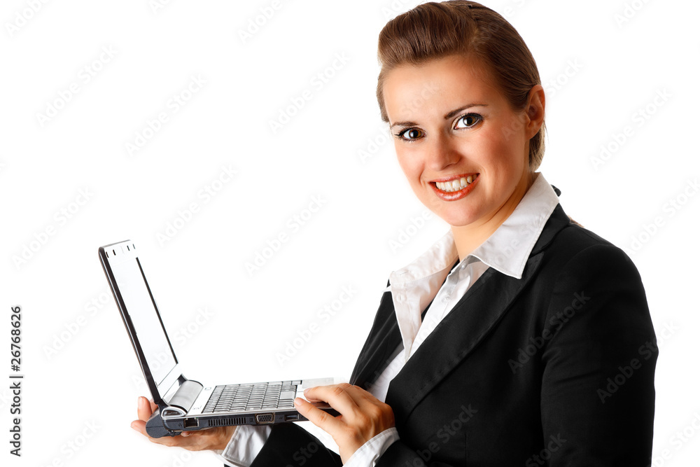 smiling modern business woman holding laptop in hand smiling modern business woman holding laptop in hand