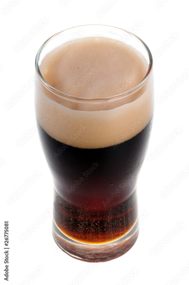 A pint of stout isolated on white background
