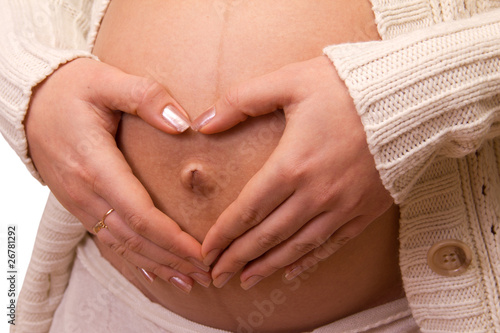 Wallpaper Mural Heart shaped hands of pregnant woman Torontodigital.ca
