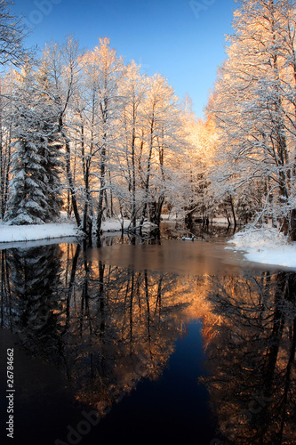 Winter river golden sunset