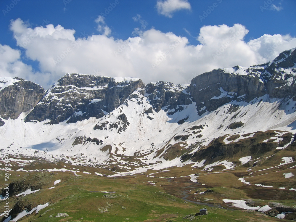 The Troumouse Circus mountains with a chalet below