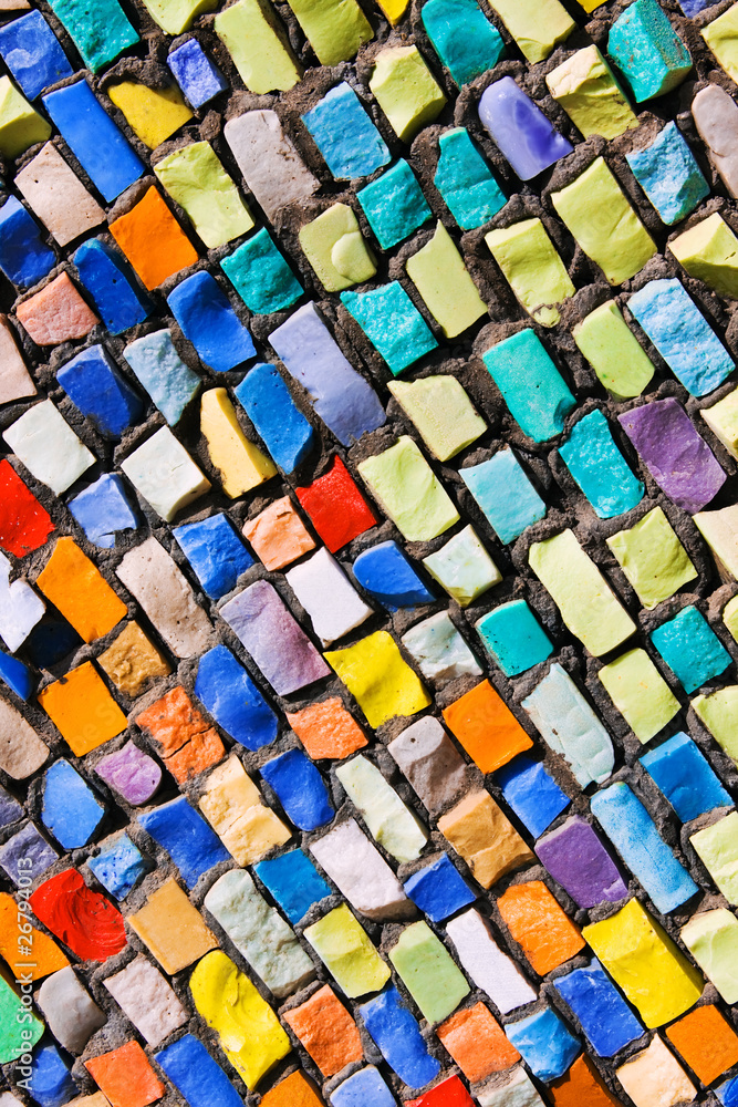 Diagonal colorful mosaic texture on wall