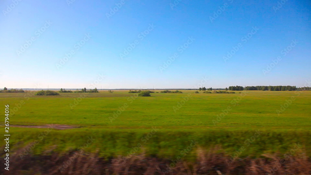 Siberian landscape through the window of an express train. Siberian landscape through the window of an express train.