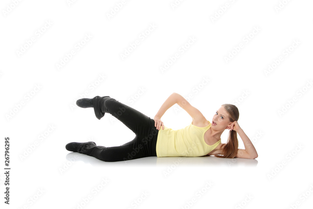 Fototapeta premium Young woman doing exercise