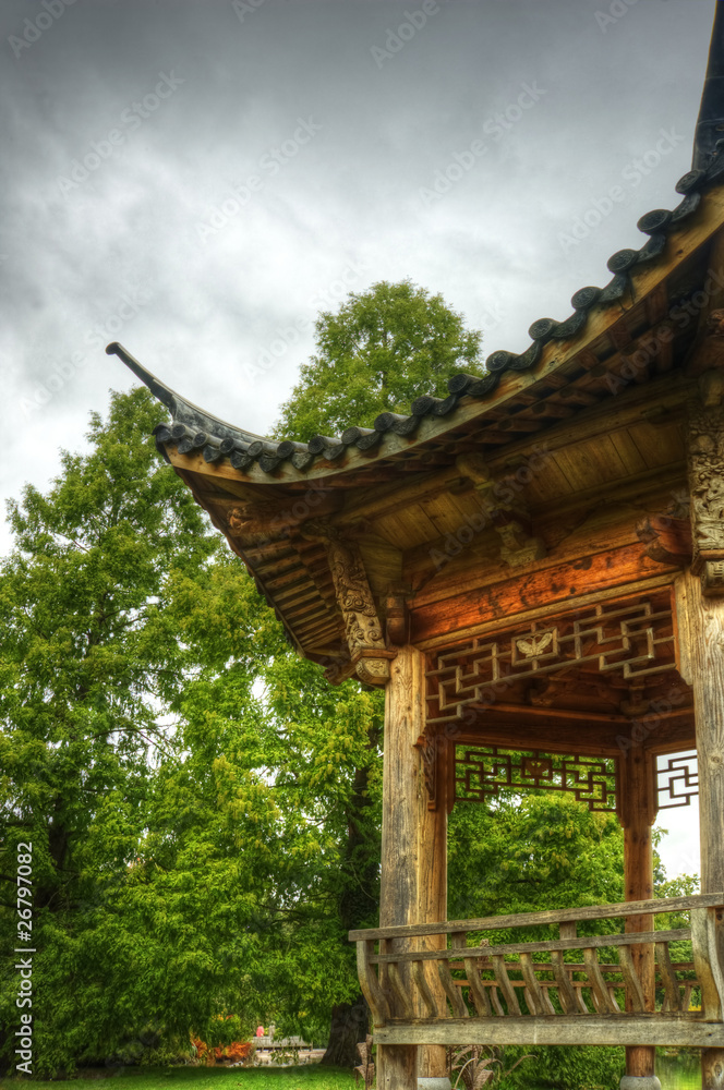 Superbly detailed pagoda in lush green gardens Superbly detailed pagoda in lush green gardens