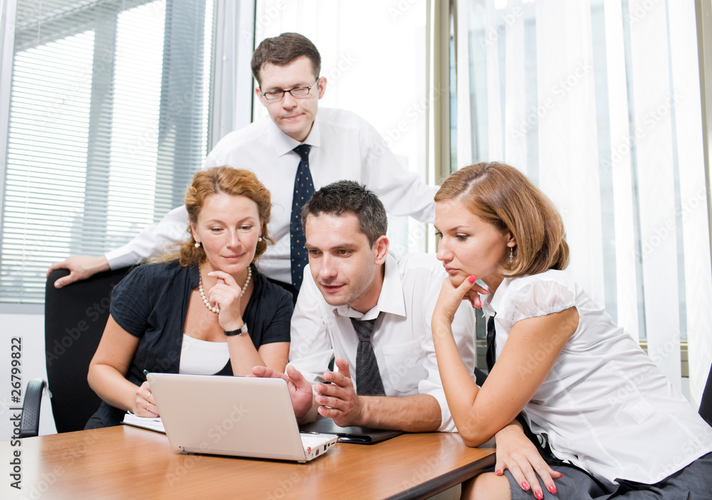 Manager with office workers on meeting