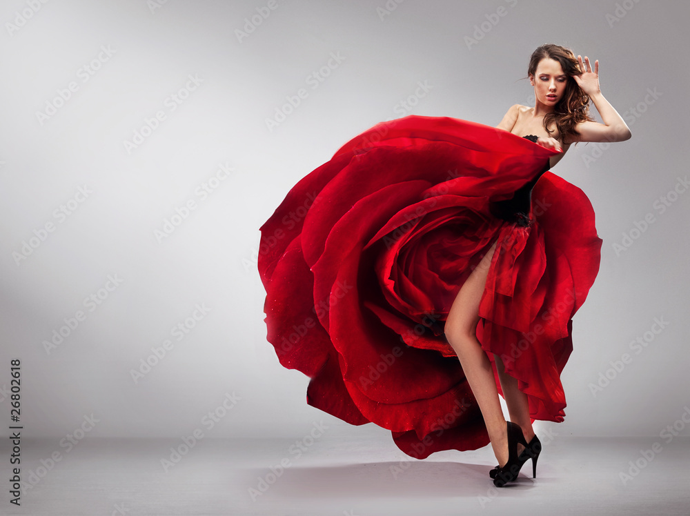 Beautiful young lady wearing red rose dress Stock-Foto | Adobe Stock