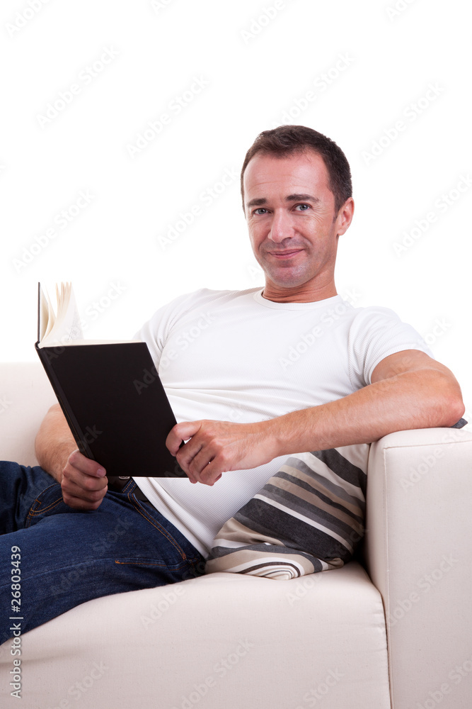 man on the sofa reading a book man on the sofa reading a book