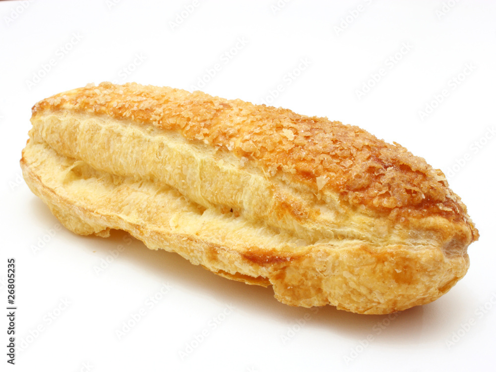 White roll strewed by sugar