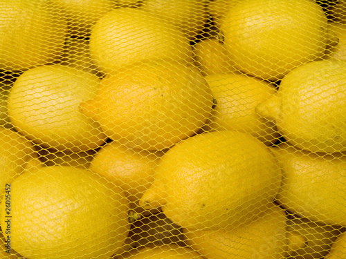 Lemons behind a grid