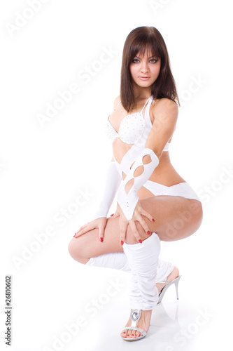 Sexy brunette in white bikini