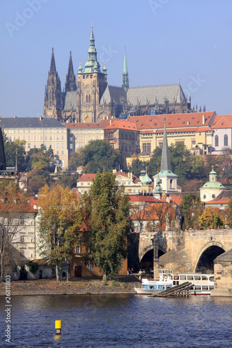 View on the autumn Prague gothic Castle with the Charles Bridge