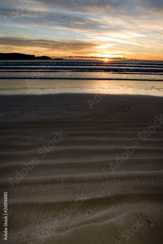 Fototapeta Naklejka Na Ścianę i Meble -  Beach Sunset across sand
