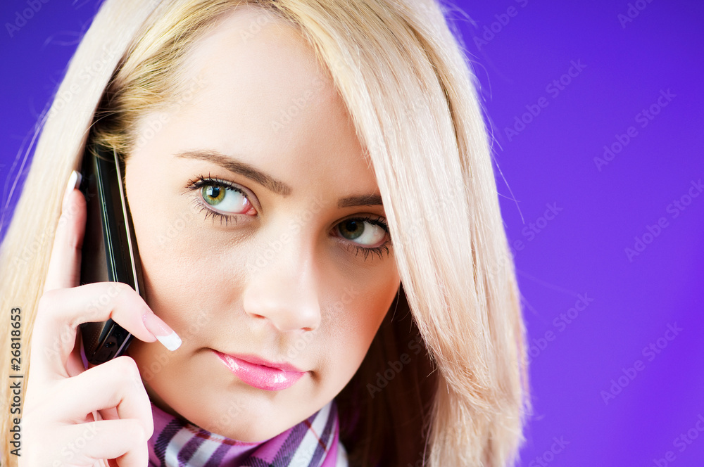 Attractive girl speaking on the mobile phone Attractive girl speaking on the mobile phone