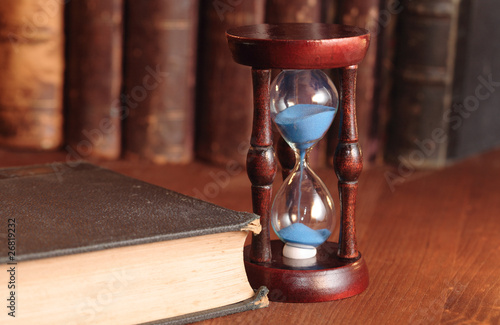 Hourglass And Old Books