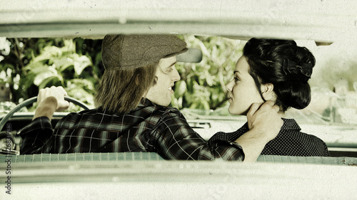 Young Couple in Old Car photo