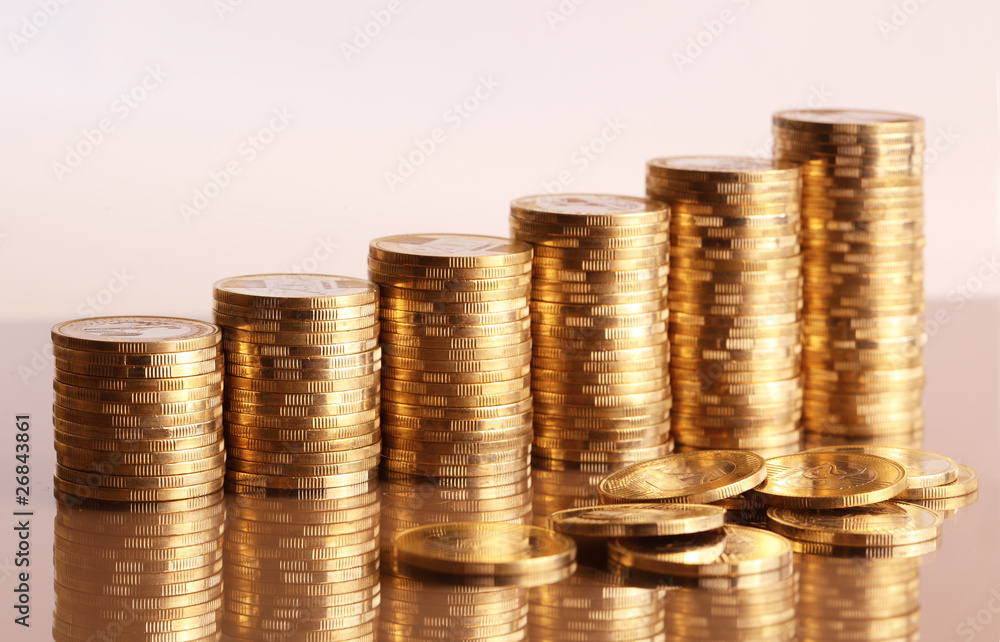 Six coin piles with reflection in gold color Six coin piles with reflection in gold color