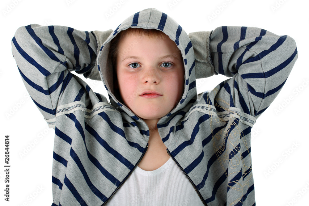 Young boy with hands behind head in gray hood isolated on white Young boy with hands behind head in gray hood isolated on white