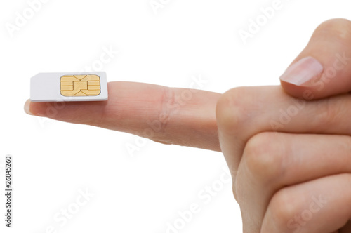Sim card In a hand isolated on white background