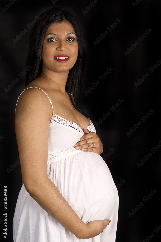 sexy beautiful pregnant Indian woman in white dress Stock Photo | Adobe  Stock