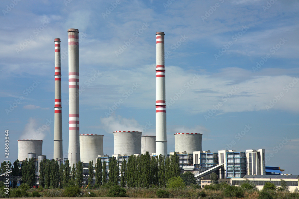 coal power plant with chimney and cooling towers