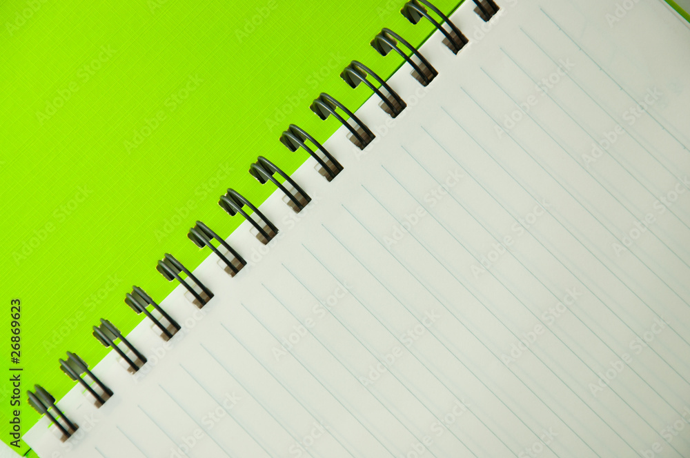isolated green notebook on white. isolated green notebook on white.