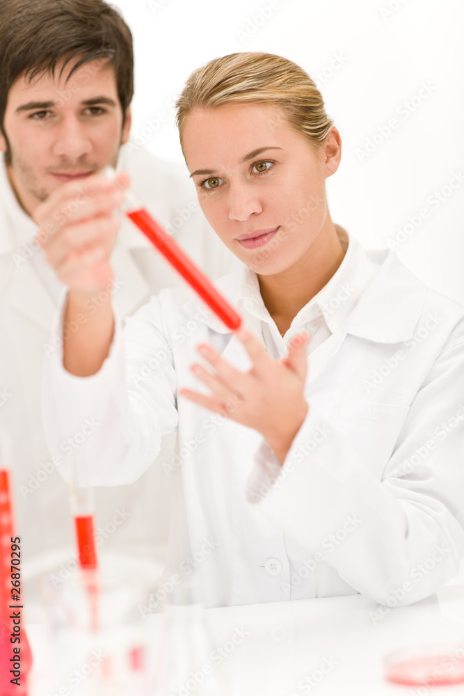 Scientists in laboratory - flu virus test tube Scientists in laboratory - flu virus test tube